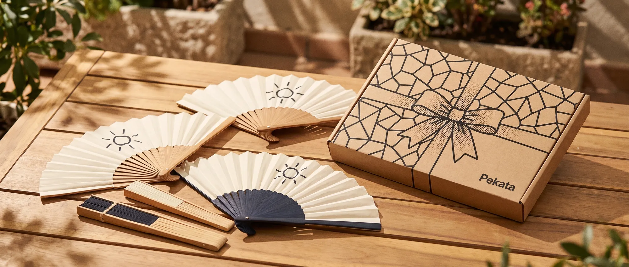Custom bamboo folding fans and card paddle fans with a company logo